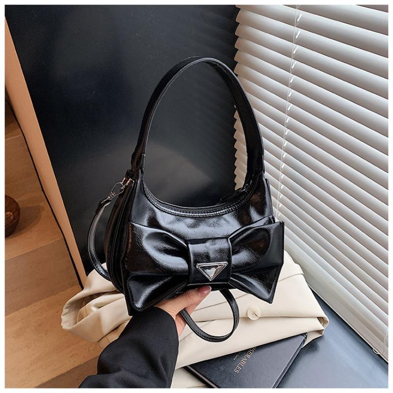 

Underarm bow bag women s new niche fashion trendy zipper soft leather one shoulder contrasting color messenger bag чорний