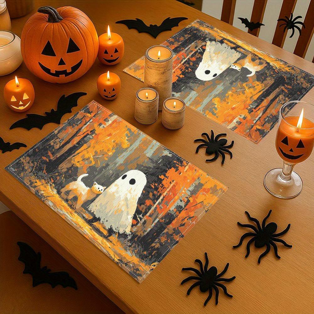 A Set of Four Adorable Halloween Ghosts Featuring Two Black Eyes, These Placemats Are Washable And Perfect for Your Dining Table, Making Them an