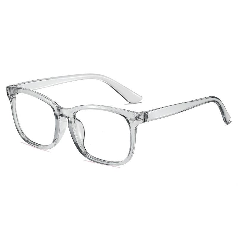 Retro Flat-Lens Anti-Blue Light Glasses with Transparent Frame and Metal Studs, Fashionable for Men and Women.