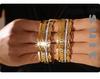 Dubai Bestseller: Exquisite Rhinestone-Studded NK Chain Bracelet with Day-Character Buckle, 18k Gold-Plated Titanium Steel, Light Luxury Style.