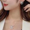 Korean Version Of Temperament Hollow Flower Earrings Personalized Full Diamond Stud Earrings Women'S Silver Needle Copper High-End Earrings