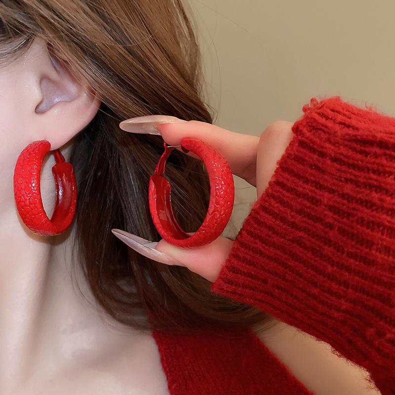Silver needle dripping oil Ankola red pigment ring earrings niche exaggerated stud earrings high-end light luxury earrings