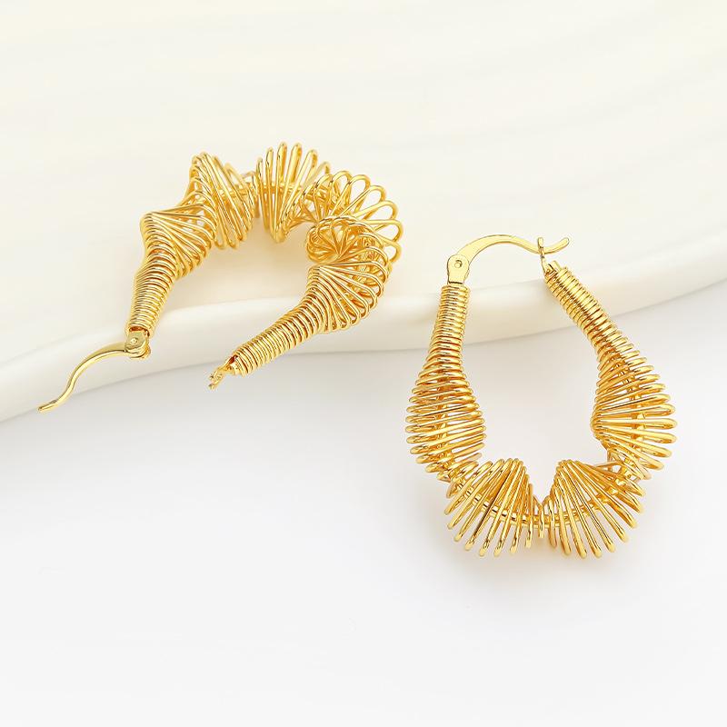 Dongguan stainless steel spring U-shaped earrings niche high-end hollow steel wire irregular winding earrings