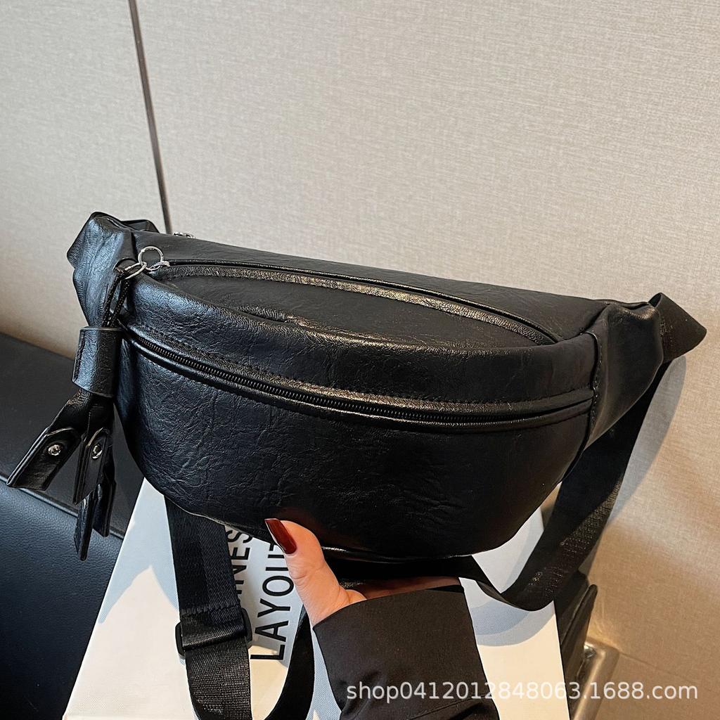 2025 new personalized foreign style women's small breast bag casual simple solid color wide shoulder strap waist bag single shoulder messenger bag wom