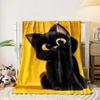 A black kitten with large yellow eyes sits against a bright yellow background. for all seasons blanket lunch break throw gift