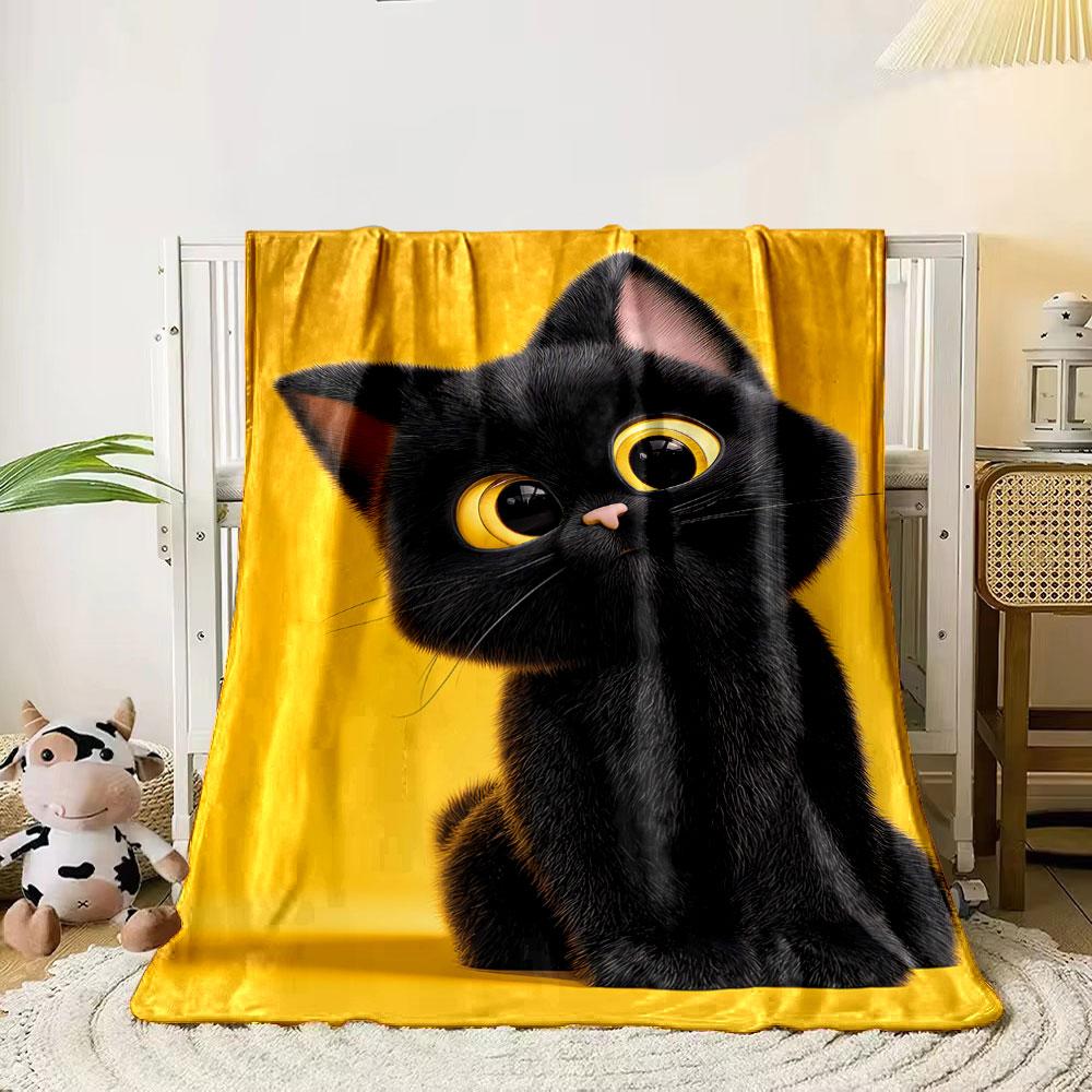 A black kitten with large yellow eyes sits against a bright yellow background. for all seasons blanket lunch break throw gift