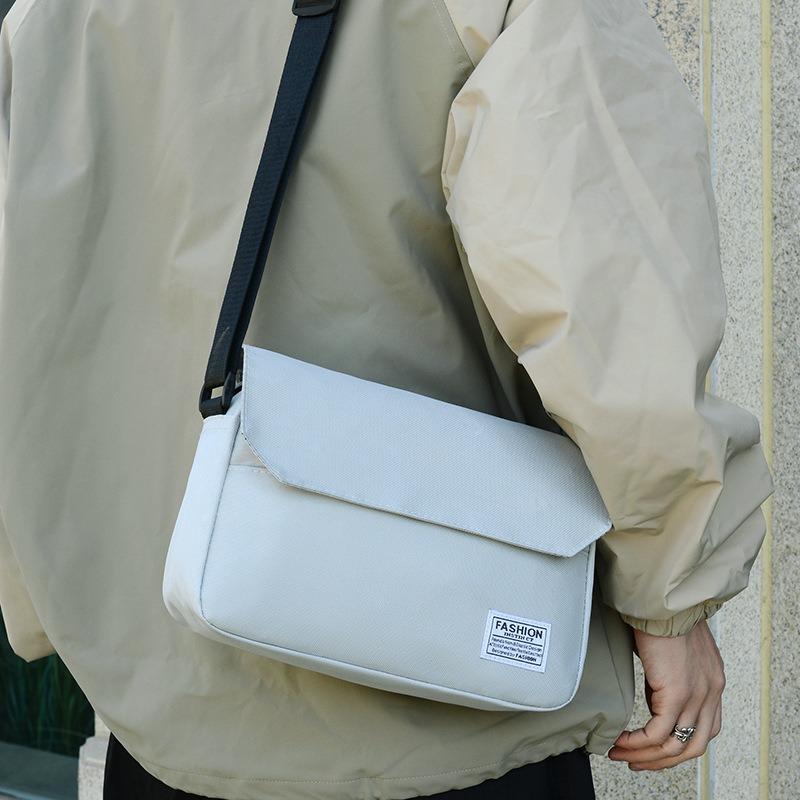 Stylish and simple shoulder bag New large-capacity simple and portable versatile messenger bag Outdoor sports business trip mailman bag Men