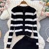 Autumn And Winter Korean Version Of The Collision Color Stripes Hollow Knitted Cardigan Plus Half-Body Skirt Two-Piece Set