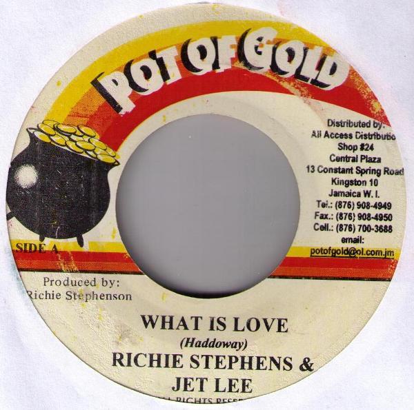 

7-дюймовая пластинка RICHIE STEPHENS & JET LEE - What Is Love NONE Pot Of Gold 2003 Ямайка Регги, Ска и Даб Б/У