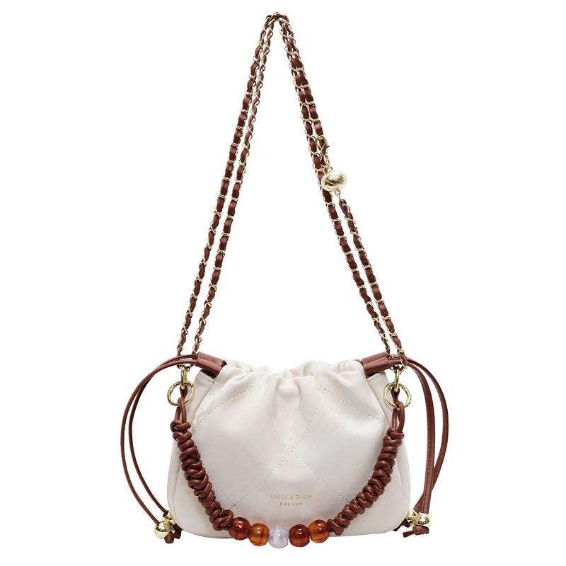 Early spring contrasting color bucket bag design sense portable bundle cloud bag lazy wind shoulder messenger bag