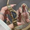 Unregelmäßige Nischen-Damenuhr Goldkette Elegante Luxus-Armbanduhr Halbmond-Zifferblatt Modeschmuck Quarzuhr Business