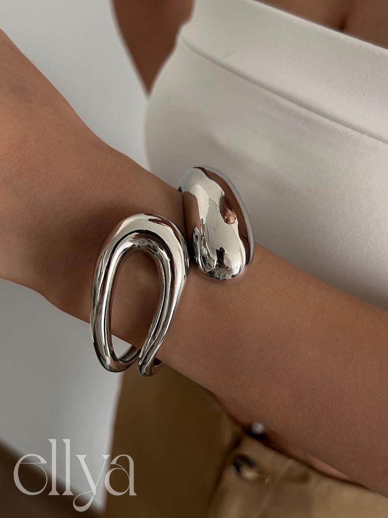 Salircon Fashion Simple Hollow Water Drop Shaped Curved Metal Spring Bangles Women Vintage Gold Color Steampunk Bracelet Jewelry