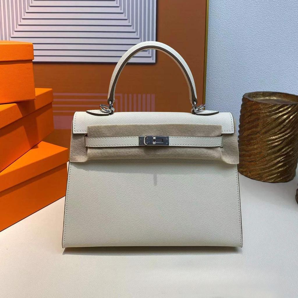 Grenzüberschreitende Hersteller Großhandel Damenhandtaschen 2023 neue Handtaschen aus Leder mit Palmenmuster tragbare Schulter-Umhängetaschen Damenhandtaschen große Kapazität