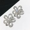 Diamond Hollow Sun Flower Fashion Atmosphere Niche High-end Design Stud Earrings
