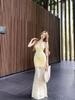 Urlaubsstil Träger rückenfreies Latzkleid Damen Sommer Blumenkleid Spice Girl Taille Fishtail Rock Hüftwickelkleid