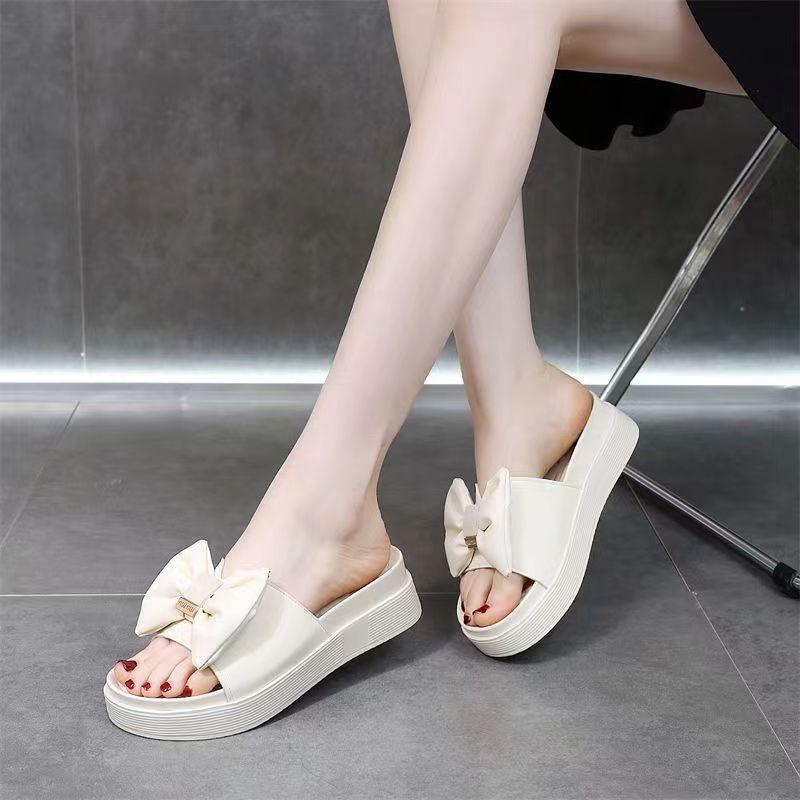 Fashion bow slippers women's summer wear one-word drag versatile muffin bottom beach cool slippers