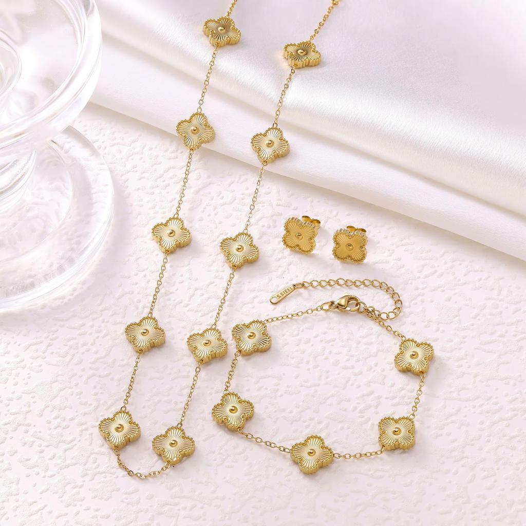 Elegant Four-Leaf Clover Jewelry Set: Titanium Steel Necklace, Earrings, and Bracelet - Light Luxury Design