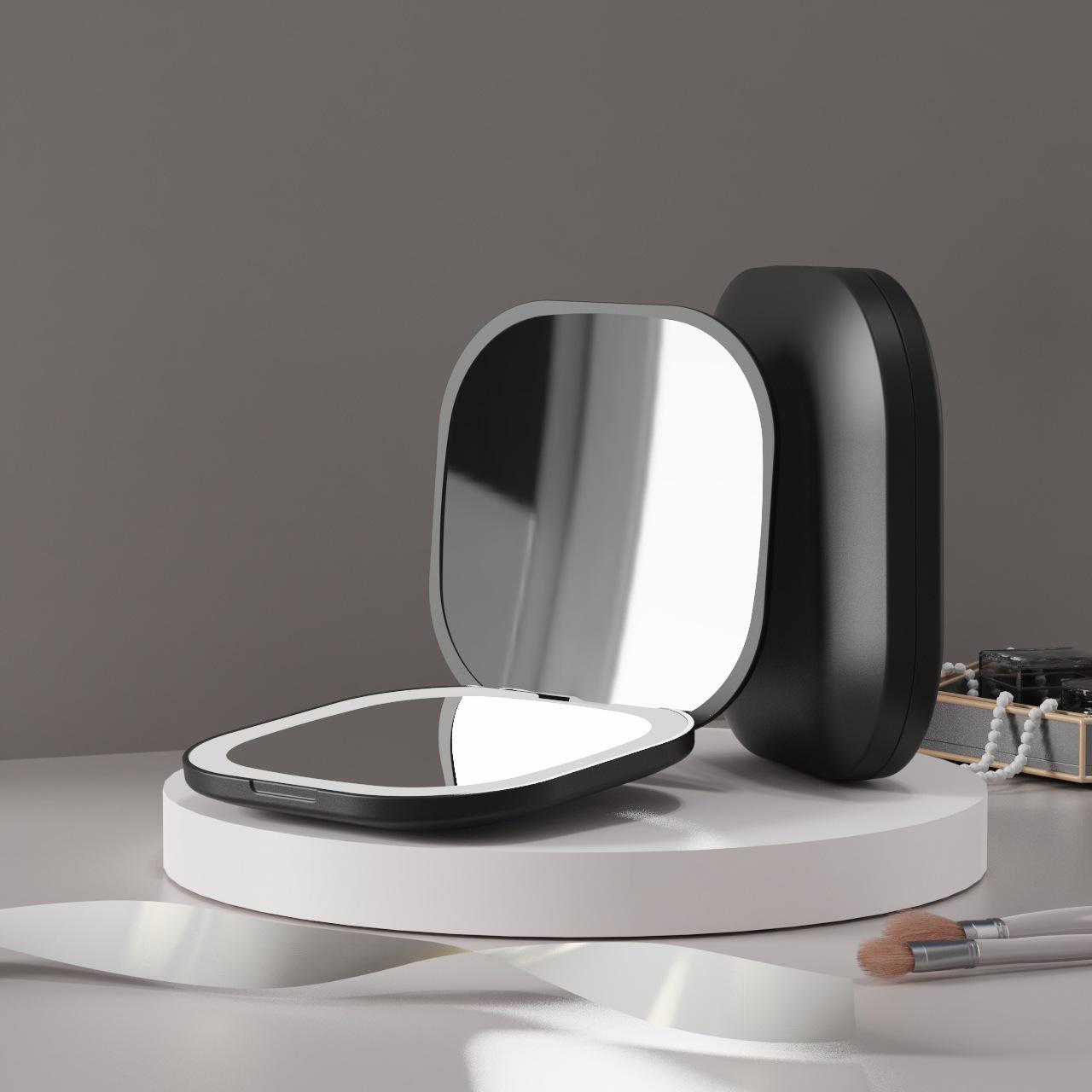 LED Foldable Double-Sided Makeup Mirror with USB Charging for Home and Travel.