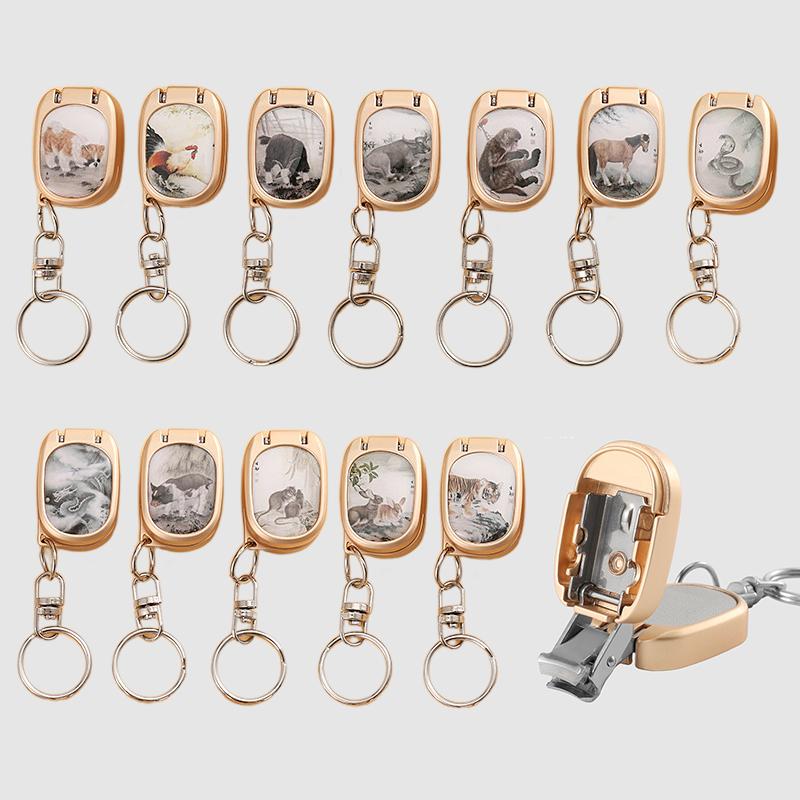 

Single Pack Splash-Proof Nail Clippers Mini Keychain Handy Folding Nail Clippers Zodiac Alloy Nail Clippers Multi-Style