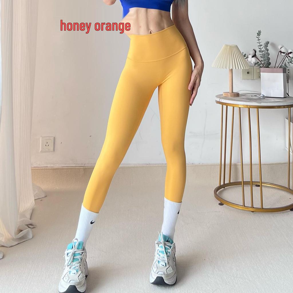 Seamless Zero-Feel Yoga Pants: High-Waisted, Bare-Skin Comfort, Back Pocket, Peach Butt Lift, Tight-Fit for Running and Fitness.