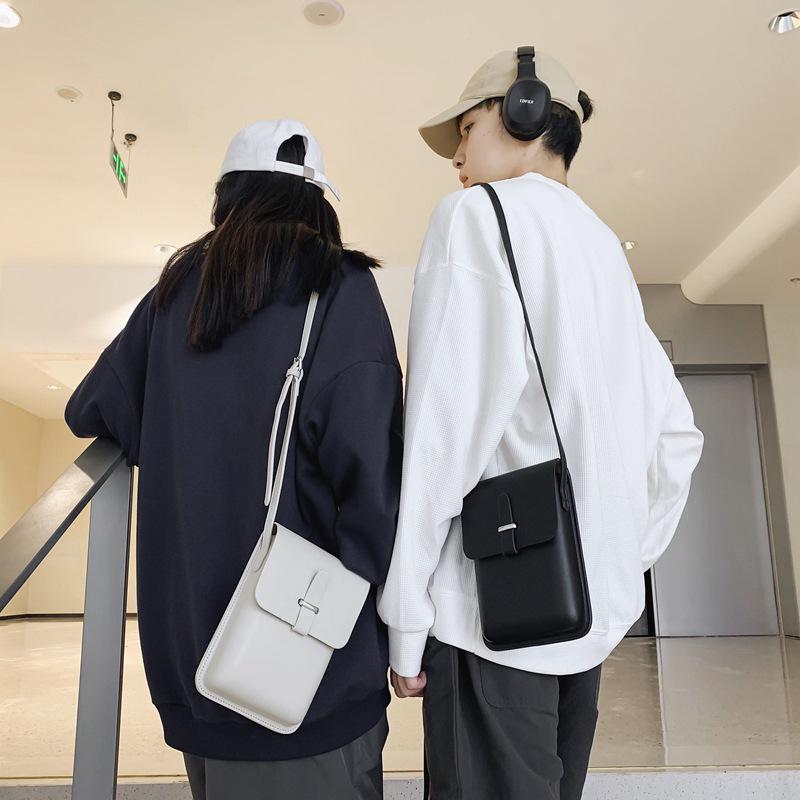 Versatile Vertical Crossbody Bag: Compact Single Compartment