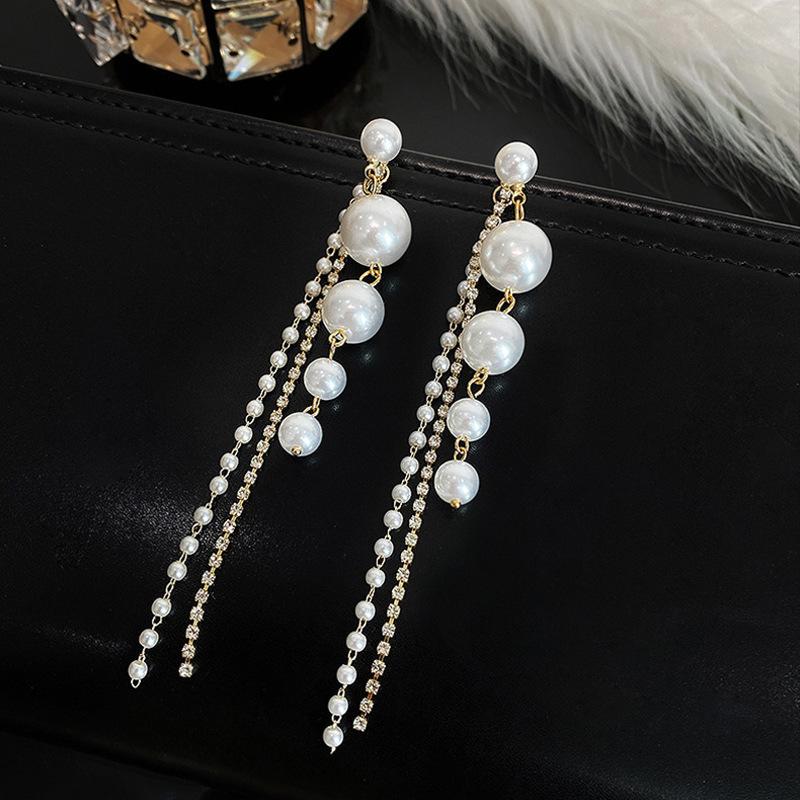 

111 silver needle long exaggerated pearl fringed stud earrings femininity new high-end light luxury earrings design earrings