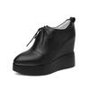 Wedge heel thick-soled leather single shoes women's 2025 new 12cm inner height increase pointed waterproof front strap-on deep mouth single shoes