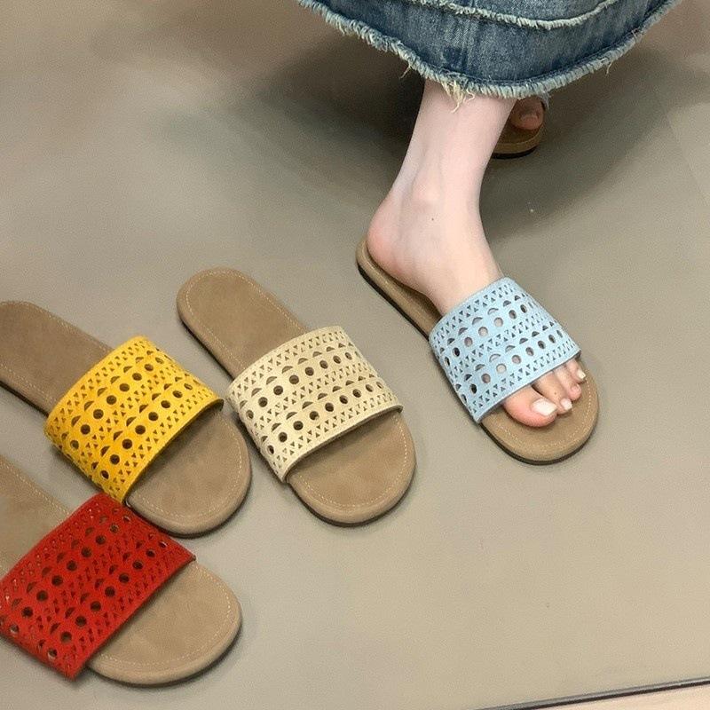 Ethnic style hollow cool slippers women's summer beach slippers 2025 new one-word drag niche