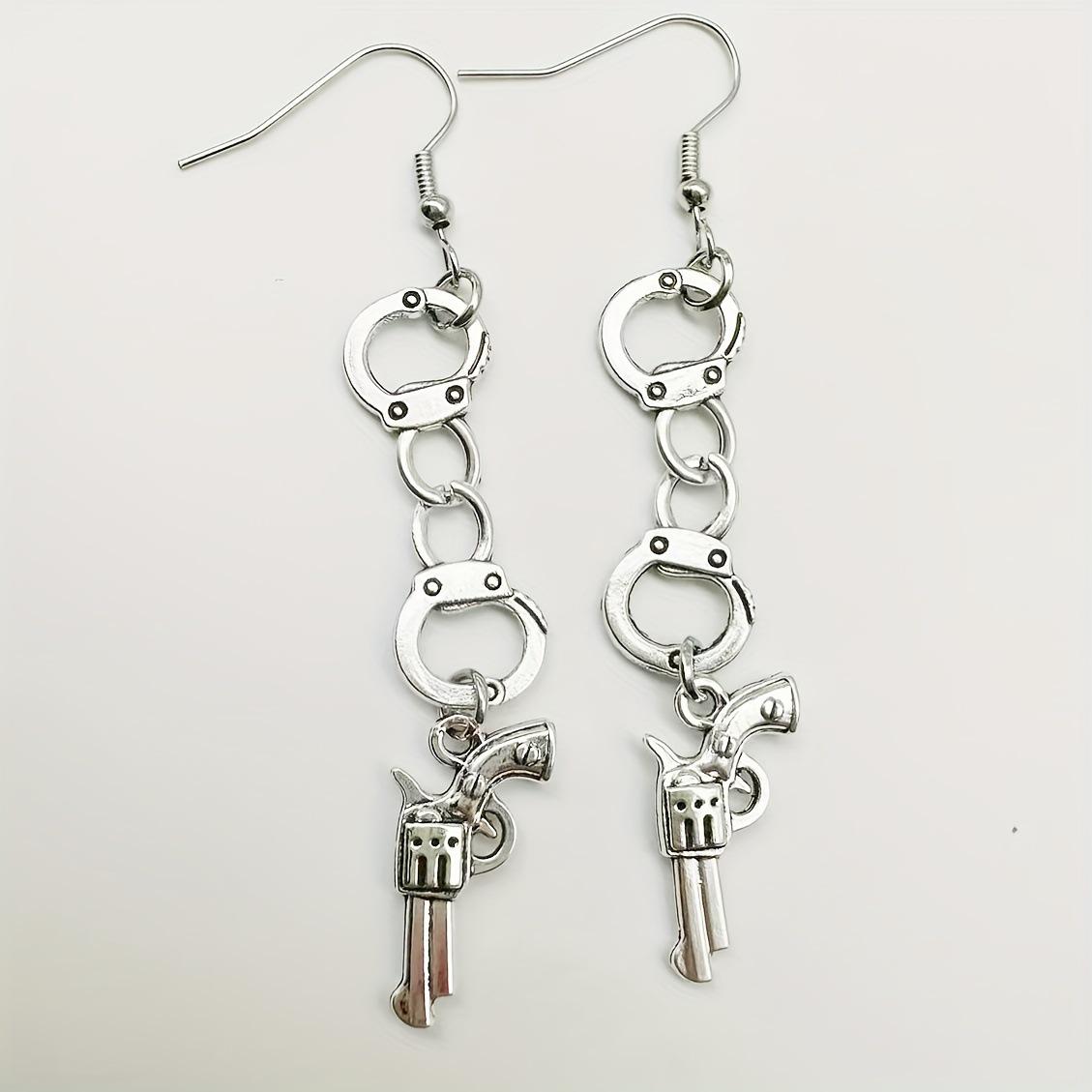 

Trendy European Punk Earrings with Pistol and Handcuff Charms серебряный