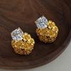 Gold and silver series zircon stud earrings two-color gold and silver hollow relief earrings light luxury cold shining versatile ears