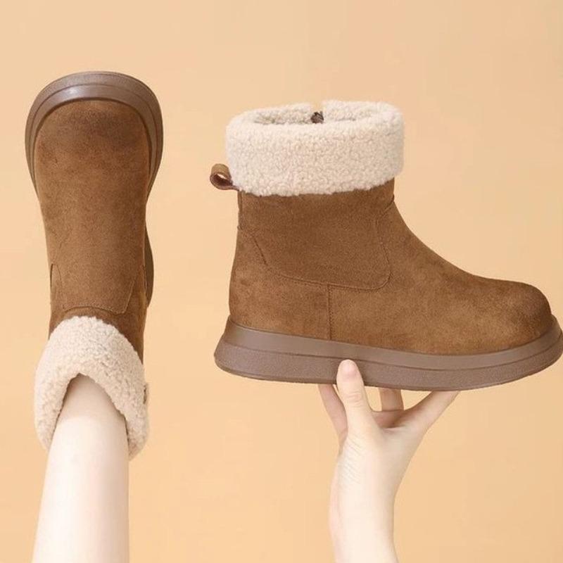 A Woman Is Wearing Fashionable and Casual Fleece Warm Snow Boots and Round-toed Cotton Shoes