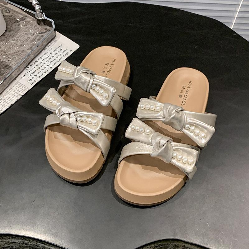 Gentle bow beautiful cool slippers women's summer wear 2025 new with skirt beach soft flat bottom one-word slippers