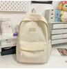 Schoolbag Japanese simple backpack large capacity high sense casual backpack male multi-function solid color female college student schoolbag tide