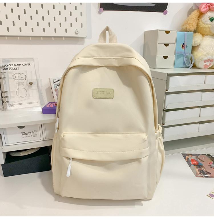 Schoolbag Japanese simple backpack large capacity high sense casual backpack male multi-function solid color female college student schoolbag tide