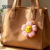 Angstlösungs-Gadget Lächelnde Blume Schlüsselanhänger Fidget Spielzeug Floraler Klicker Sensorisches Spielzeug für Stress Handtaschen-Schmuckstück Linderung Hängender Taschenanhänger mit