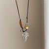 Stylish Alloy Accent Necklace With Sliding Closure Braided Cord and Natural Wood Materials