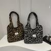 Fashion and lazy winter new leopard print plush bucket bag design personalized shoulder underarm women's bag
