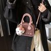 Retro portable bowling bag women's 2025 autumn new fashion texture portable small square bag simple messenger bag