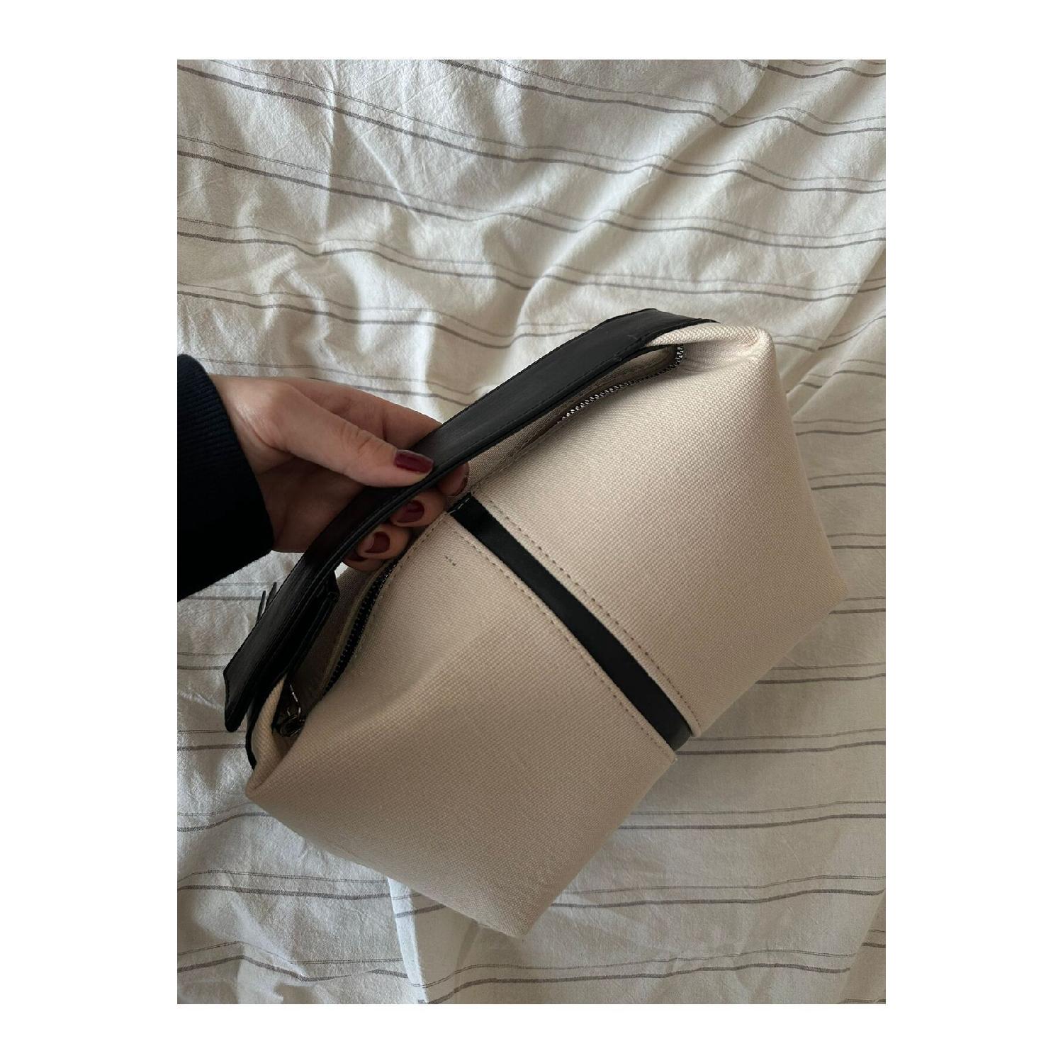 

Жіноча міні-сумочка кремово-чорного кольору Canvas Archi Küçük Boy