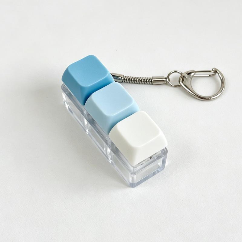 Sleutelhanger voor stressverlichting: Decompressie Kubus met Vier Knoppen & Toetsenbord Hanger