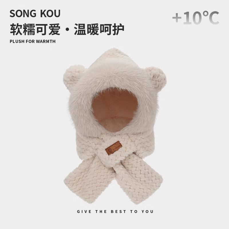 This integrated scarf and hat is a warm, plush, thickened faux rabbit fur hat perfect for autumn and winter, with cute ear flaps.