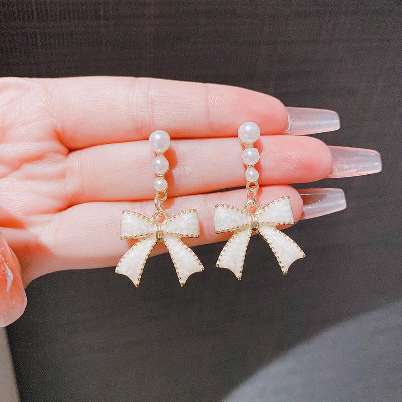 Silver Needle New Super Fairy Temperament Bow Earrings Women's Light Luxury Niche Versatile Pearl Stud Earrings