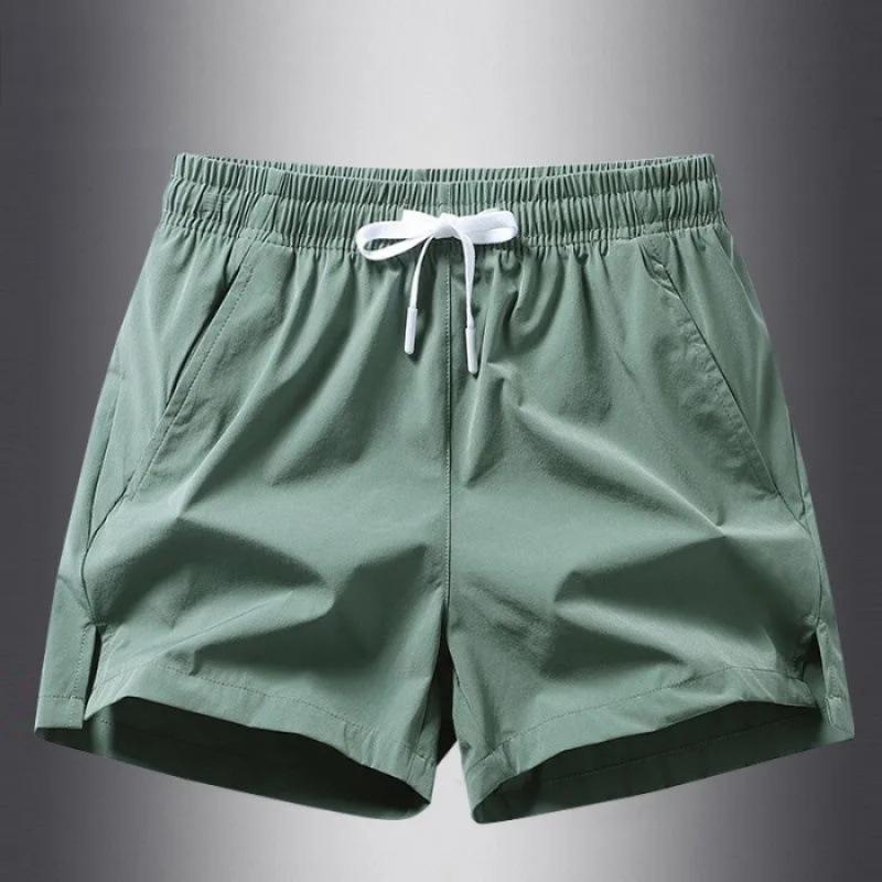 

Мужские и женские спортивные штаны Летний новый стиль Ледяной шелк Быстросохнущие Для бега на открытом воздухе Фитнес Повседневные Универсальные Парные шорты Брюки три четверти 3XL зелёный