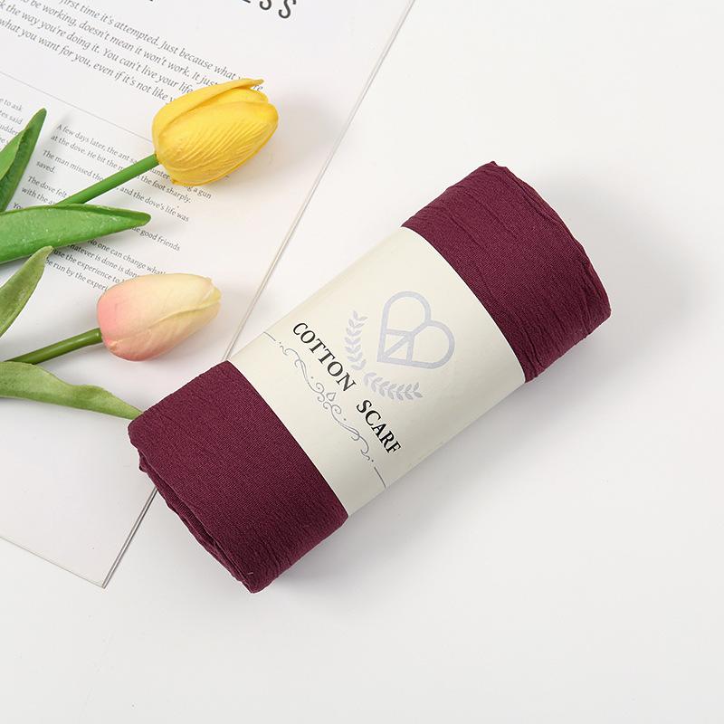 Autumn and winter new micro-elastic crumpled cotton blended long towel right angle lock edge polyester headscarf hot-selling solid color scarf