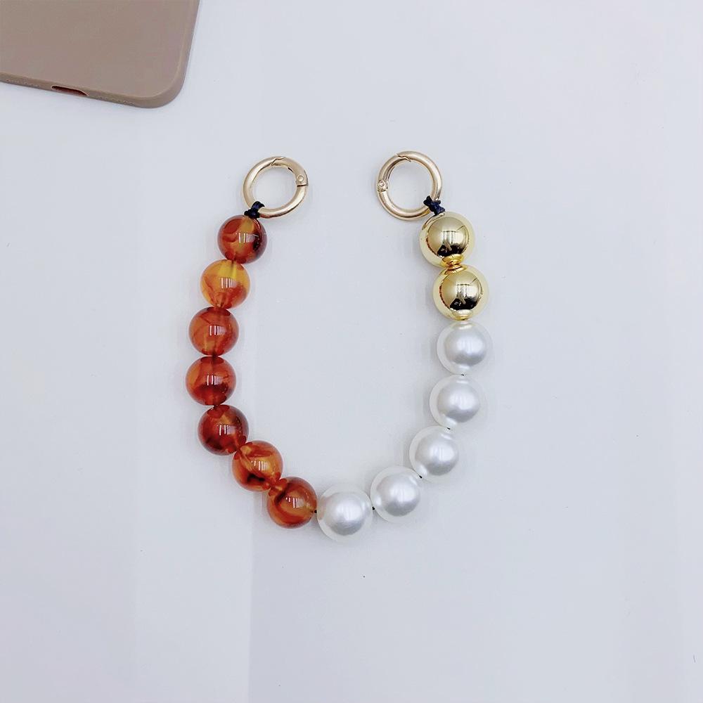 

INS wind pearl acrylic leopard print bead fashion chain anti-lost hand carry pendant mobile phone chain