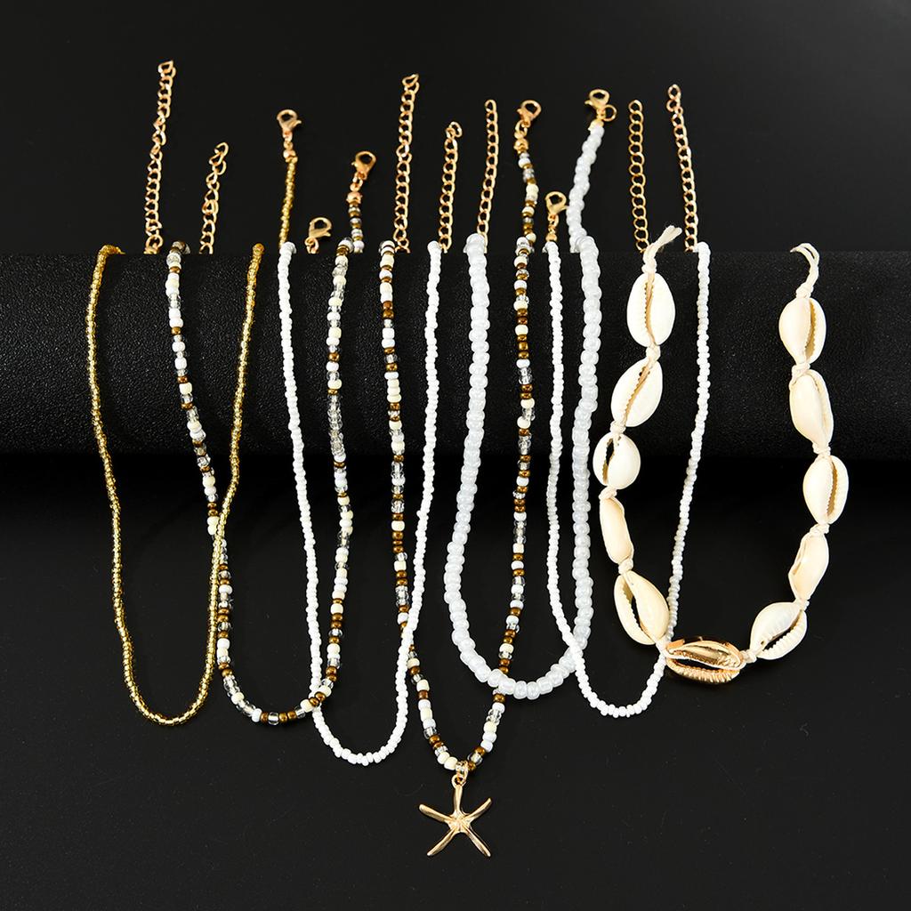 7Pcs/Set Boho Starfish Conch Rice Beads Pendant Necklace for Women Fashion White Color Multi layered Necklace Set Summer Jewelry