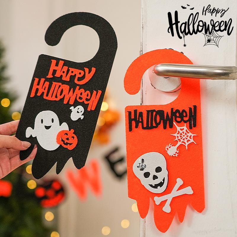 Kürbis-Türknaufhänger als Halloween-Dekoration