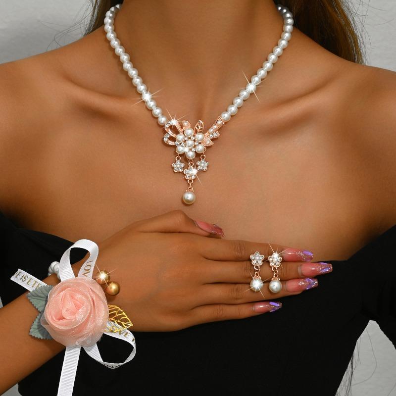 Meier Pearl bridal jewelry set: necklace, earrings, and flower bracelet