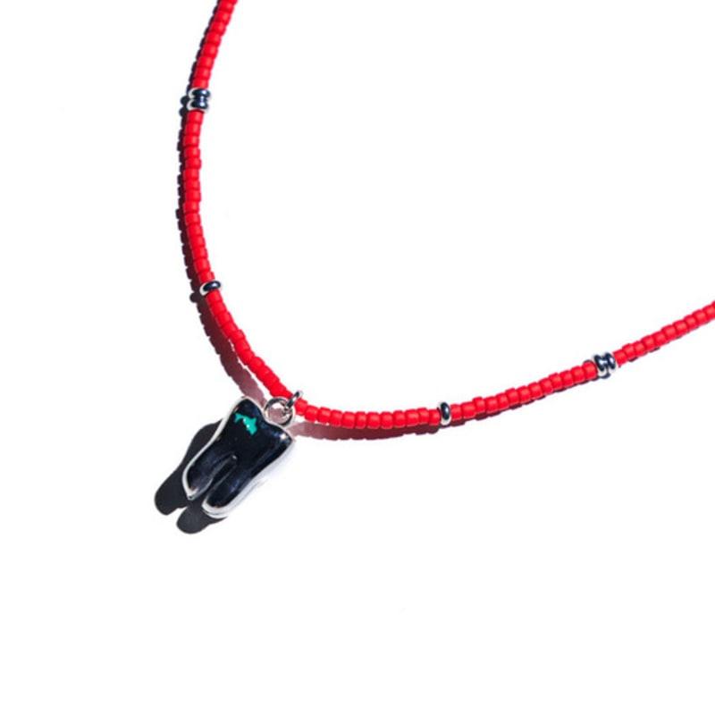 Niroserendipity RED POiNT MOLAR DOLPHiN NECKLACE #130