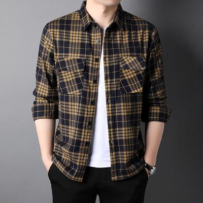 Camisa de manga larga a cuadros con solapa para hombre de otoño, versión coreana juvenil, informal, fina y a la moda.